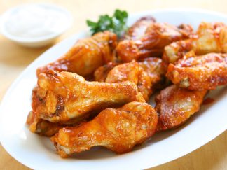 AILES ET MANCHONS DE POULET  CUITS A LA MEXICAINE